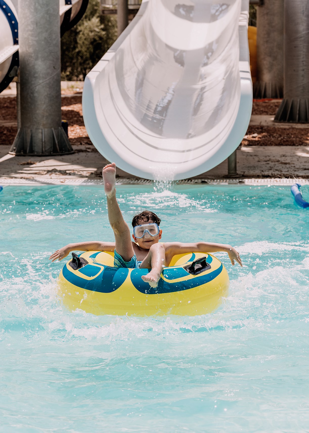 brownbeacheviaislandkidsenjoyingwaterslides